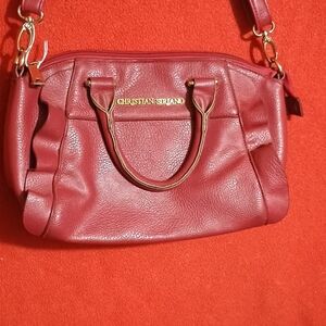 Red Christian siriano leather purse